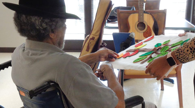 A resident is enjoying a therapeutic activity in our long term care home