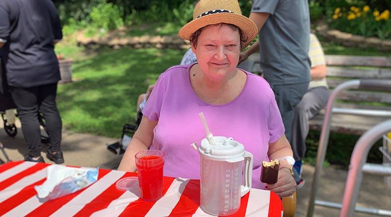 Resident enjoys picnic at our long term care facility