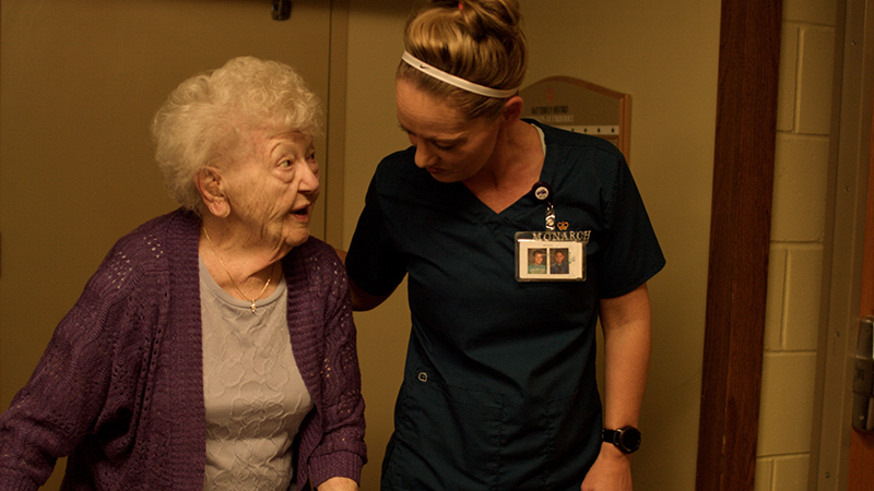 Resident in skilled nursing visits with a guest